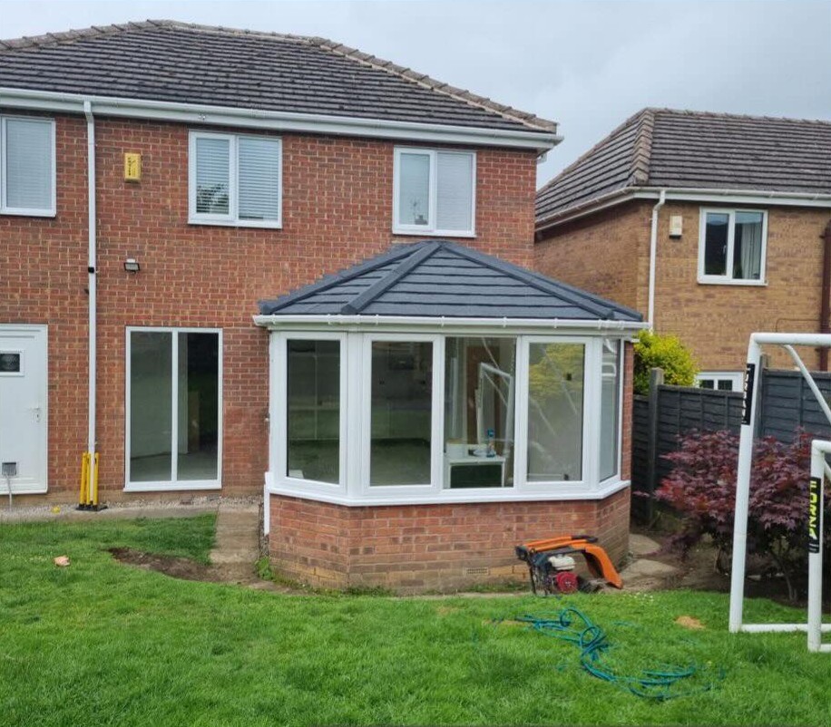 The finished conservatory seen straight on from the garden